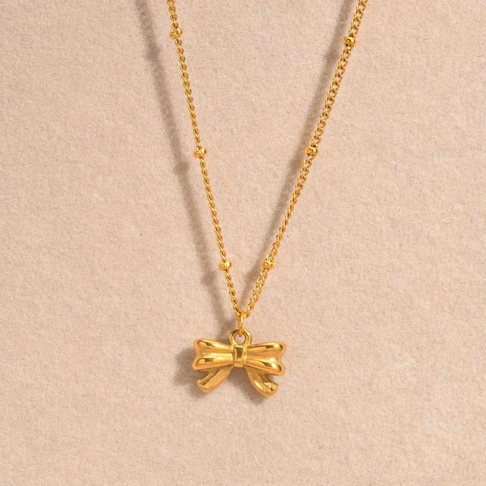 14k Dainty Feminine Bow Necklace - Aryomi