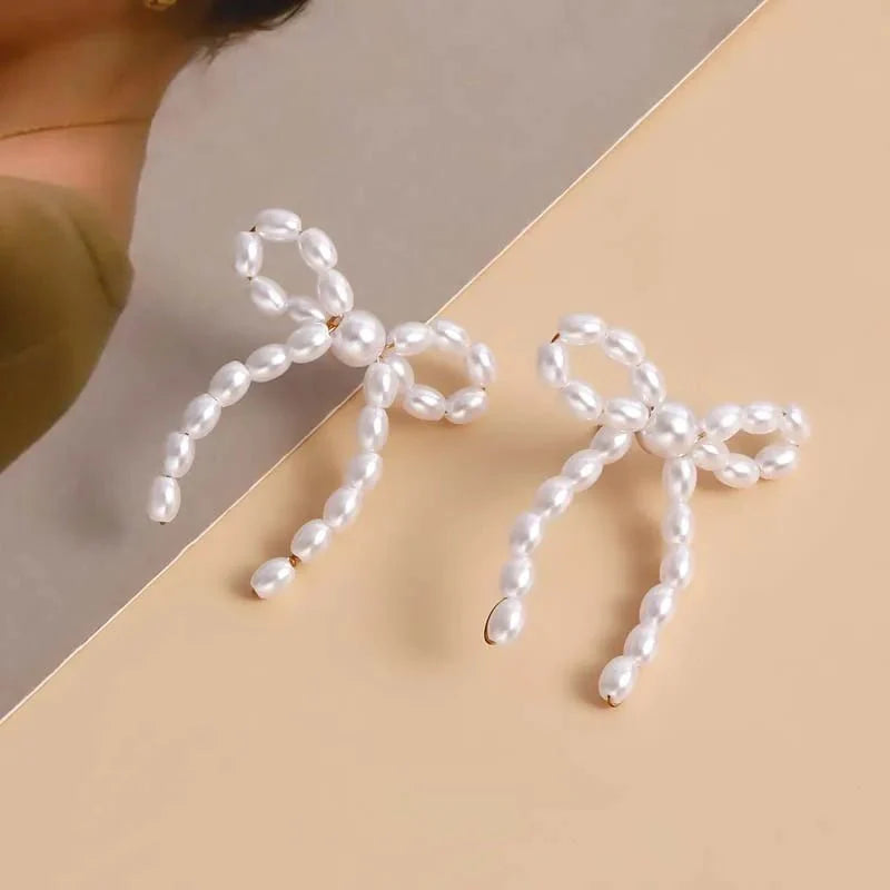 Iconic Dainty Pearl Bow Earrings - Aryomi