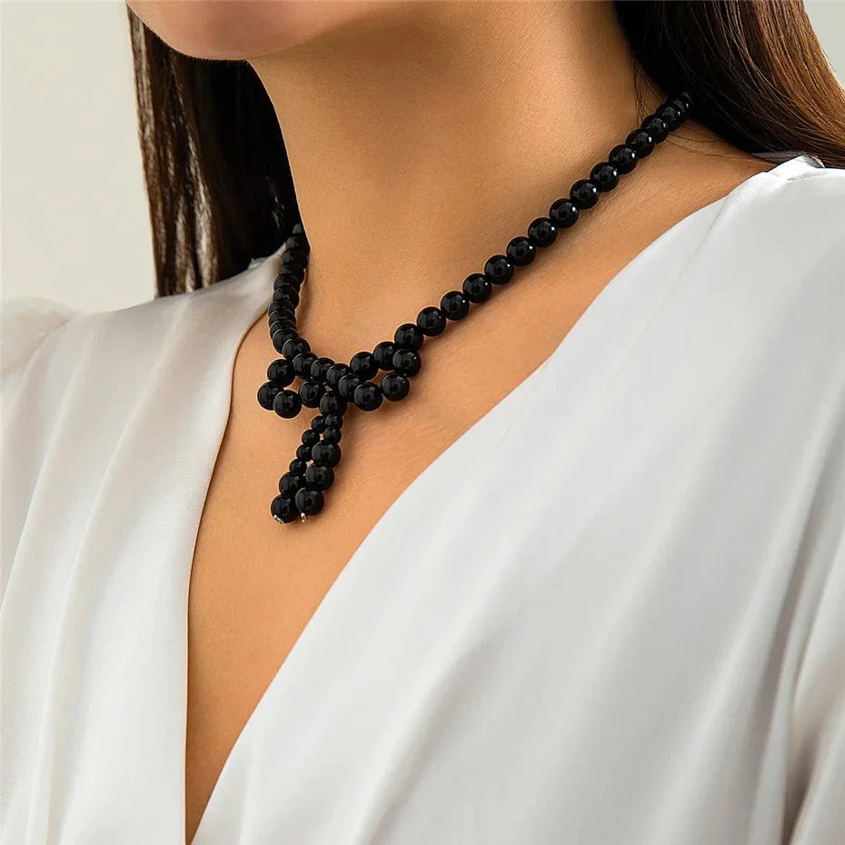 Iconic Dainty Pearl Bow Necklace - Aryomi