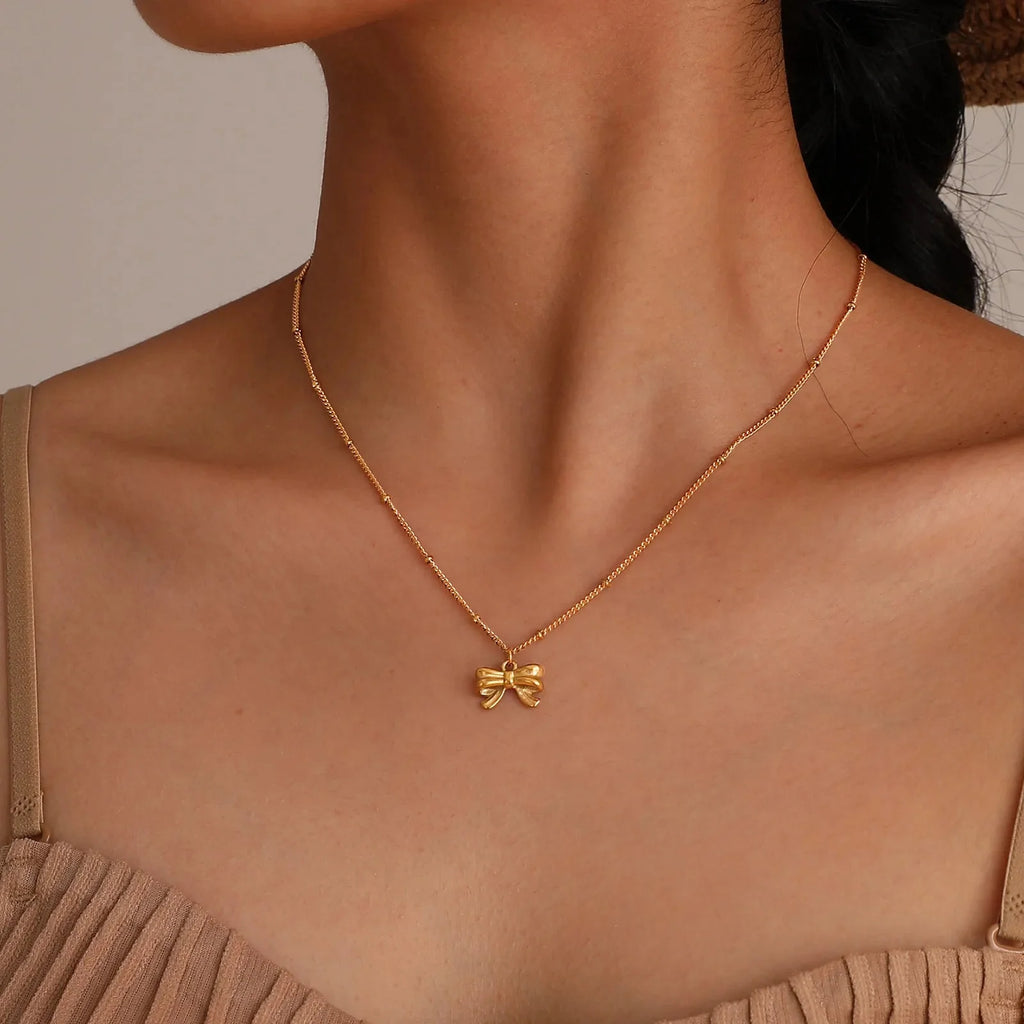 14k Dainty Feminine Bow Necklace - Aryomi