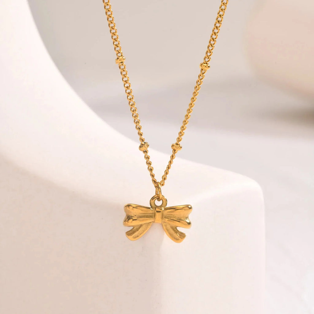 14k Dainty Feminine Bow Necklace - Aryomi
