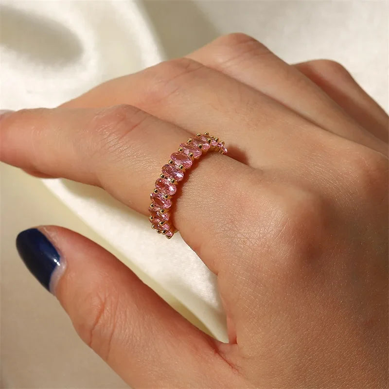 Dainty Oval Cut Diamond Adorned Ring