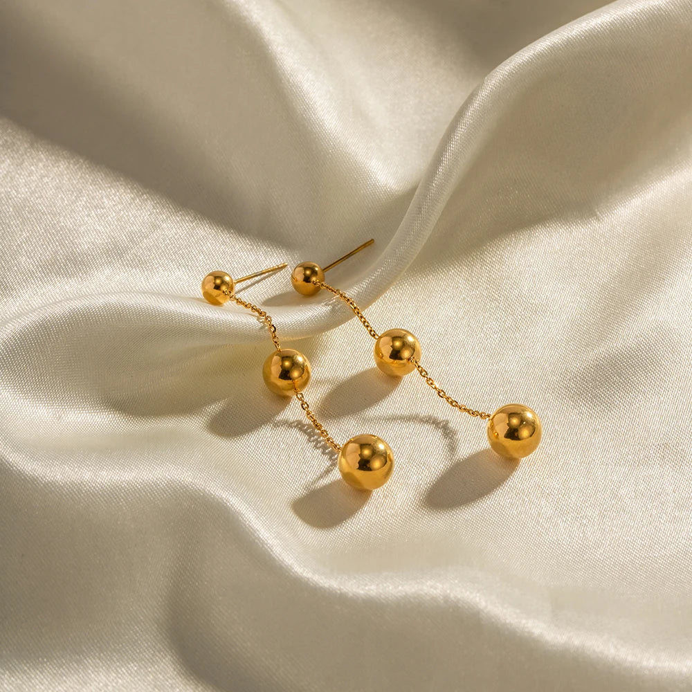 Dangle Gold Bead Tassel Earrings