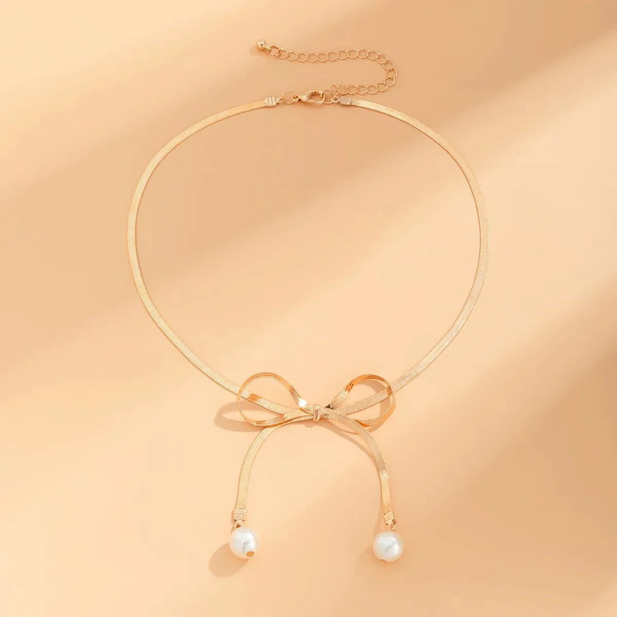 Dainty Herringbone Pearl Bow Necklace - Aryomi