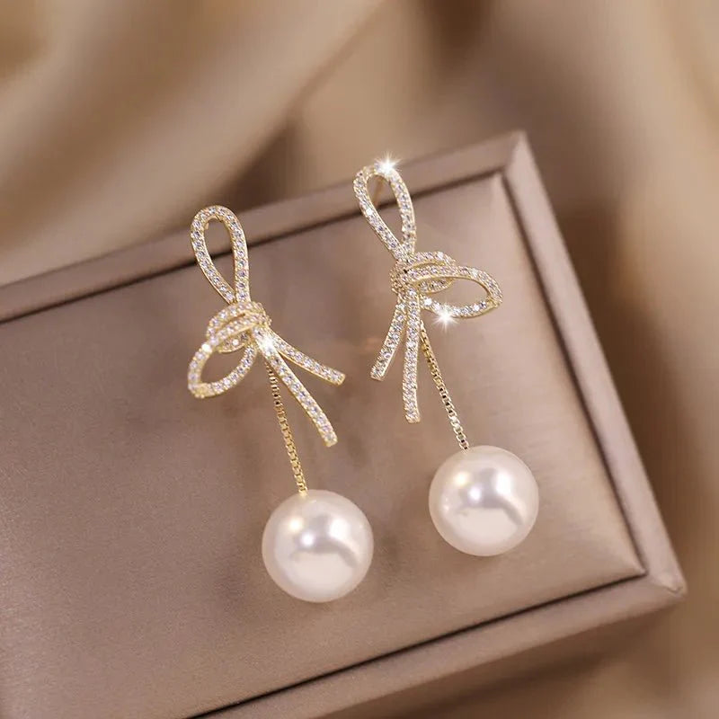 Dazzling Bowknot Pearl Drop Earrings - Aryomi