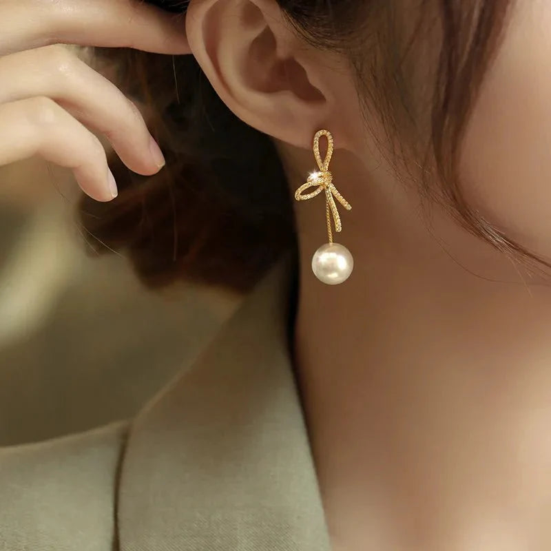 Dazzling Bowknot Pearl Drop Earrings - Aryomi