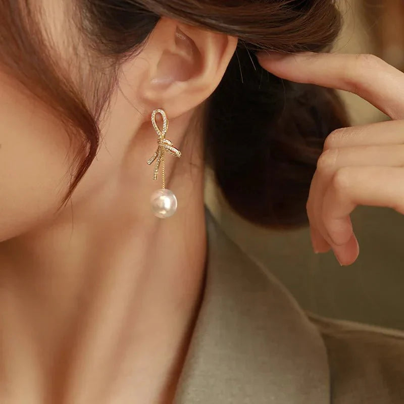 Dazzling Bowknot Pearl Drop Earrings - Aryomi