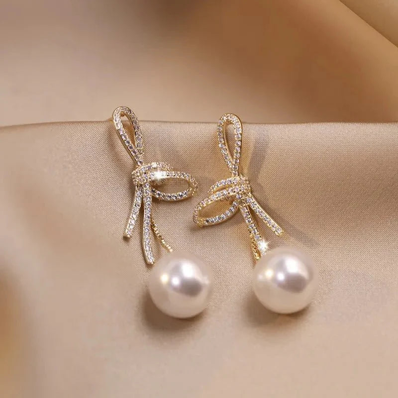 Dazzling Bowknot Pearl Drop Earrings - Aryomi
