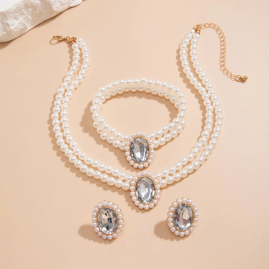 Elegant Oval Diamond Pearl Necklace, Bracelet, Earrings Set - Aryomi