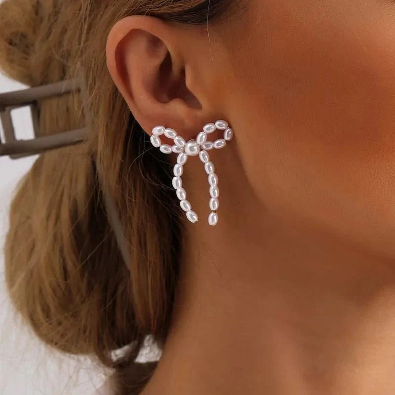 Iconic Dainty Pearl Bow Earrings - Aryomi