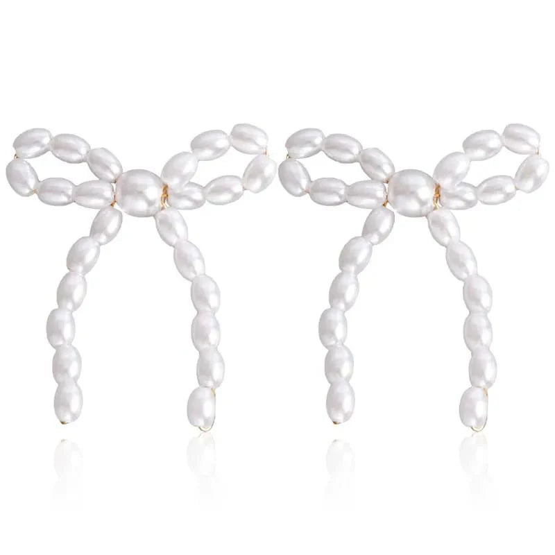 Iconic Dainty Pearl Bow Earrings - Aryomi