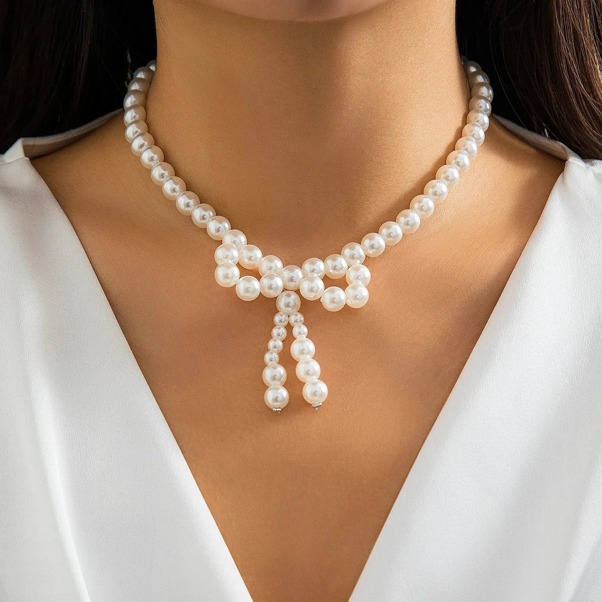Iconic Dainty Pearl Bow Necklace - Aryomi