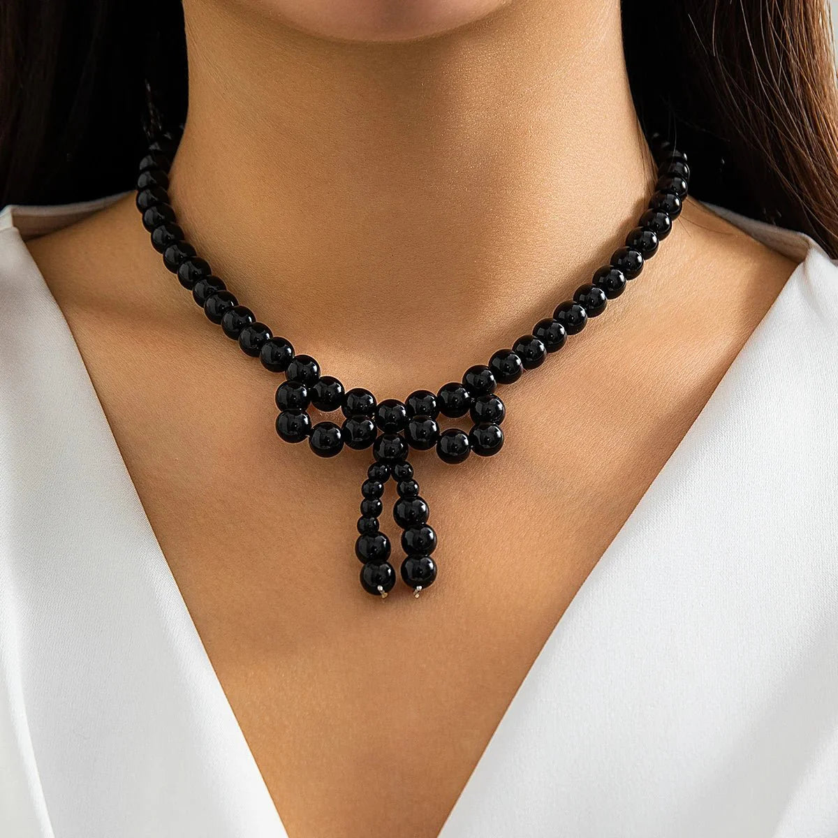 Iconic Dainty Pearl Bow Necklace - Aryomi
