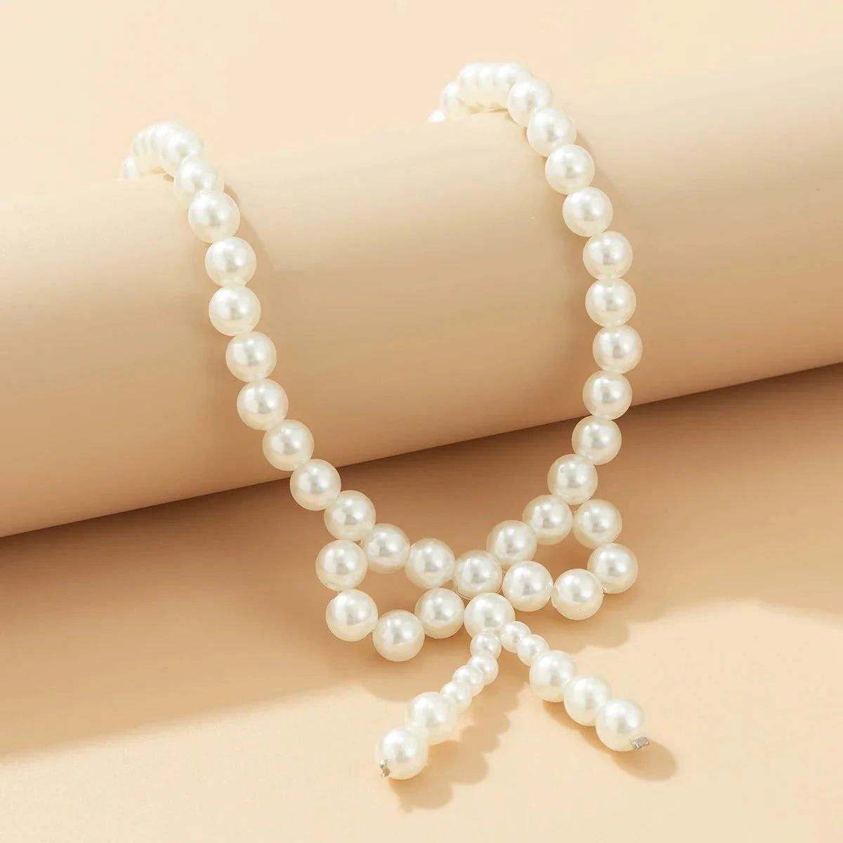 Iconic Dainty Pearl Bow Necklace - Aryomi