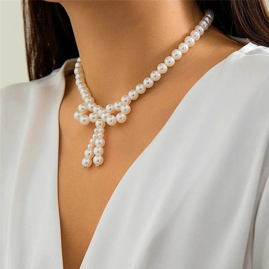 Iconic Dainty Pearl Bow Necklace - Aryomi